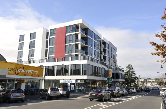 Exterior of a high density residential building along a road