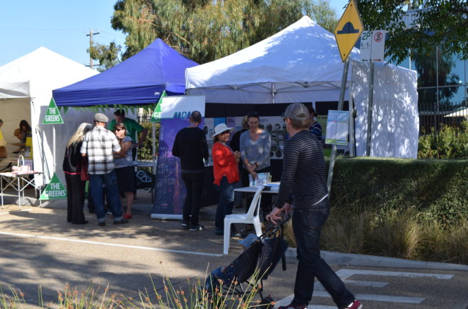 VPA Engagement at the Broadmeadows Market with a pop-up tent and various community members in discussion
