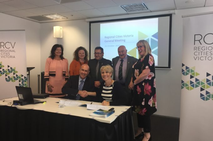Group photograph relating to the Regional Cities Victoria General Meeting with Stuart Moseley in the foreground
