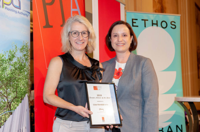 Portrait of two women with one being Lisa Kendal receiving a certificate at the 2019 Women's Breakfast